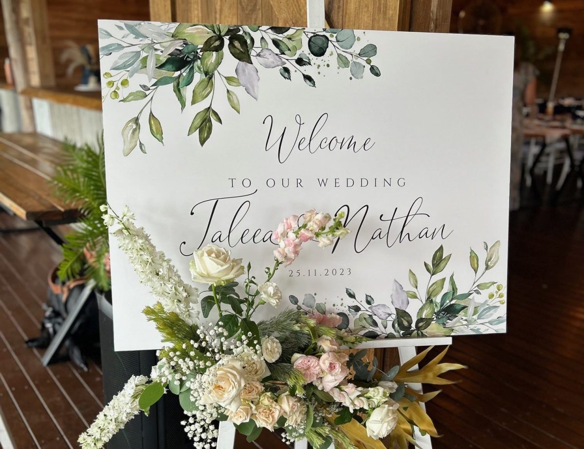 Wedding sign with flowers