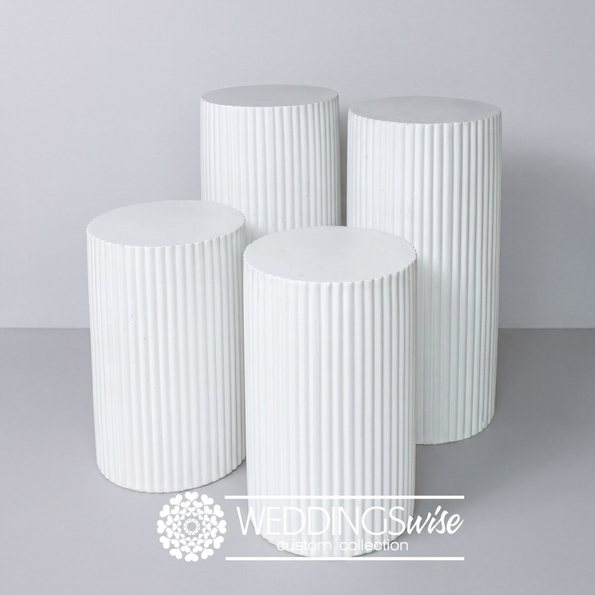 White Ribbed Cylinder Plinths- Hire
